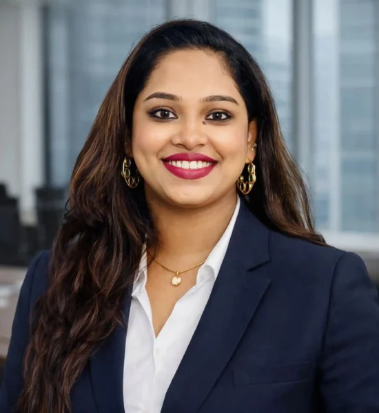 Smiling woman in professional attire.