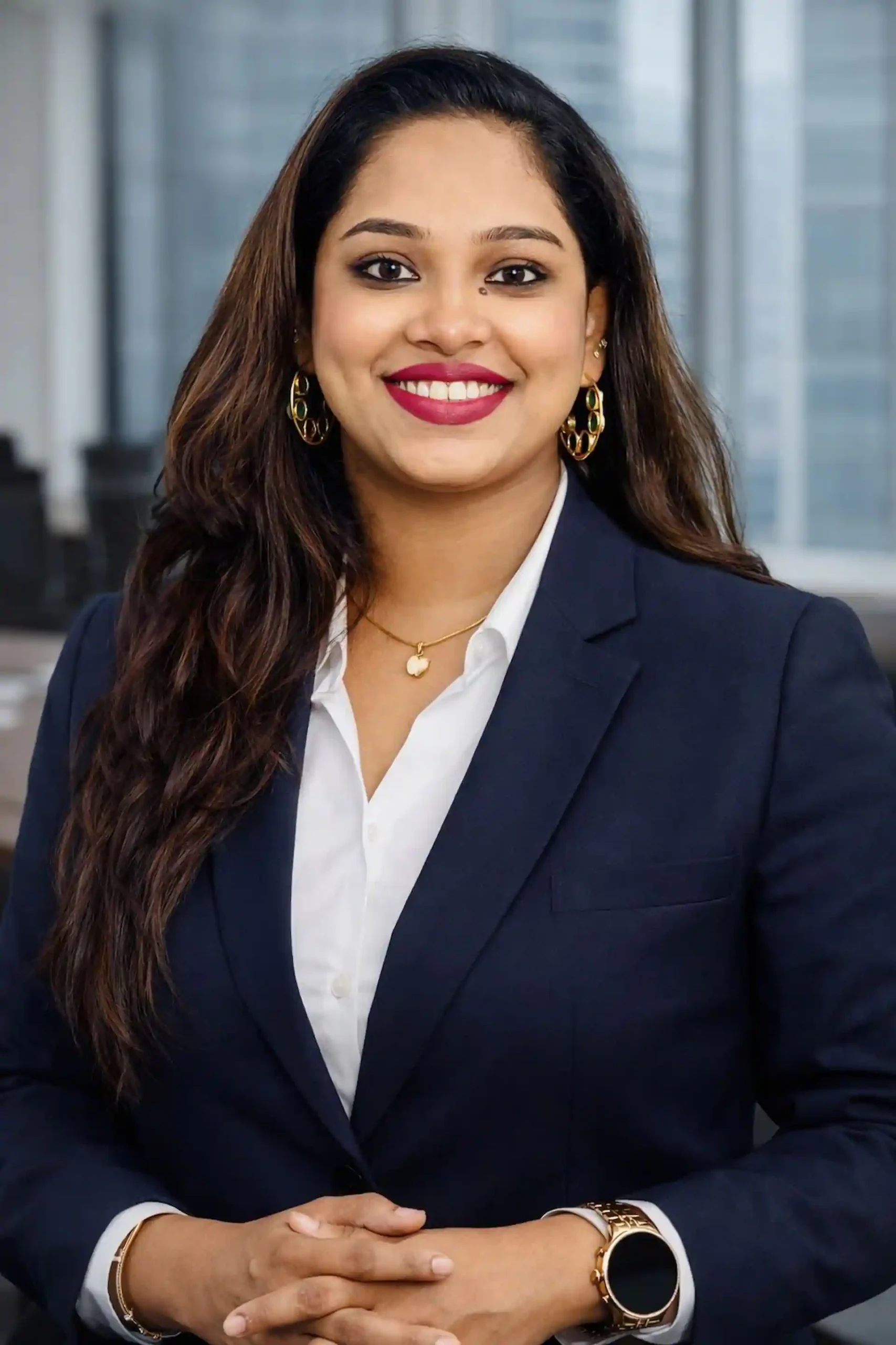 Smiling woman in professional attire.